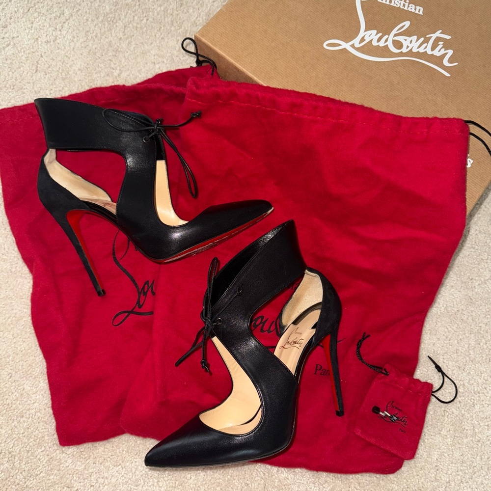 Christian Louboutin Black Cutout Heels with Red Sole